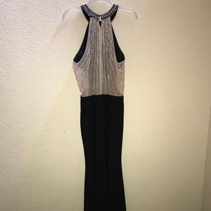 black, sleeveless, cut leg dress